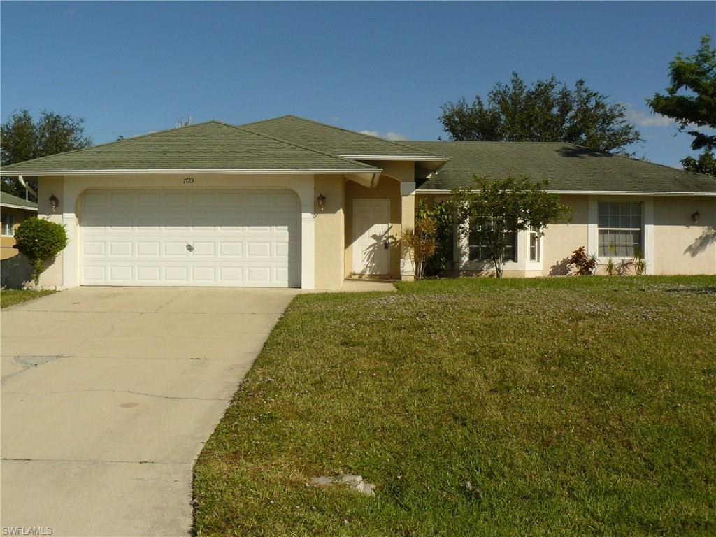 Great 3 Bedroom / 2 Bath home located in SW Cape Coral!  This home features an open and split floor plan with neutral tile throughout and the kitchen offers a white appliance package, food pantry and dining area just off of kitchen.  The master bath has a walk-in shower and his and her sinks.  Enjoy your evenings on the screened in lanai with attractive tile flooring.  Great home for those downsizing, or a winter vacation get-away and all utility assessments paid too!
