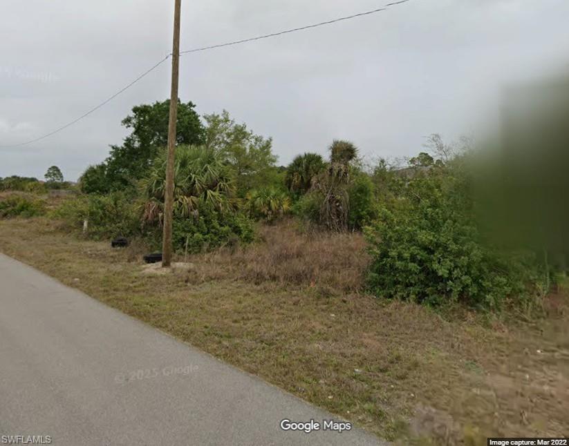 Build your dream home or investment property on this .25-acre lot located in the fast-growing and highly desirable community of Lehigh Acres, just west of Fort Myers. Offering a prime location with direct access from a main road, this square lot provides a convenient layout for future development. You'll enjoy quick access to I-75, local shopping centers, restaurants, schools, and the Southwest Florida International Airport—making everyday living or future resale even more appealing. Whether you're looking to build now or hold for future appreciation, this parcel offers an excellent opportunity in a thriving area of Southwest Florida.