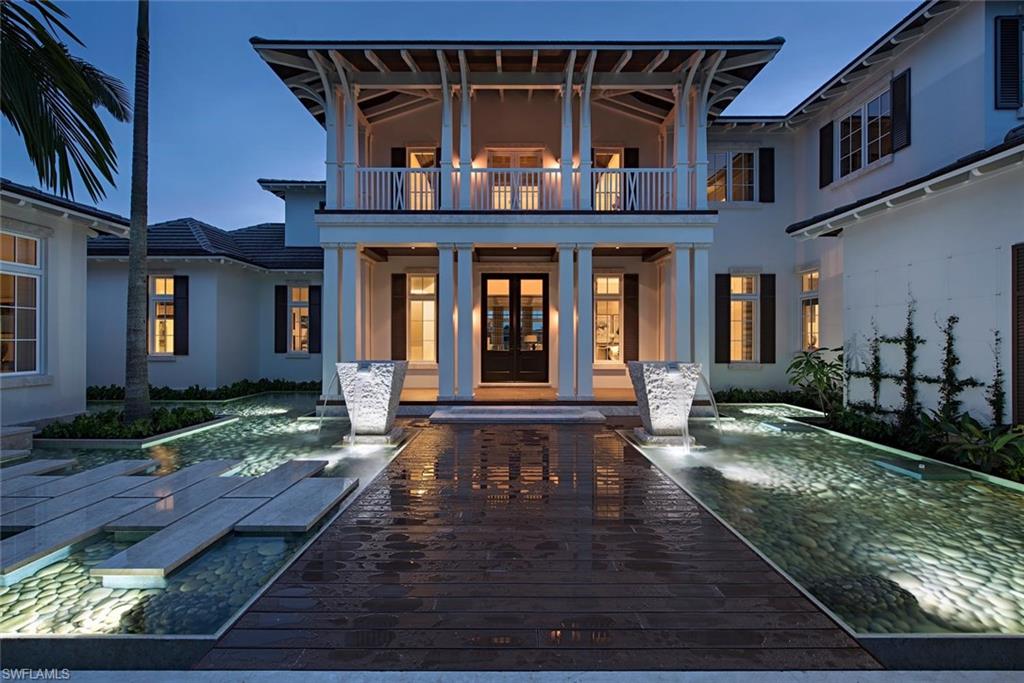 This Bahamian-West Indies inspired estate has everything the discerning homeowner demands.  This home is a transcendent iconic estate that will be enjoyed for generations.  This timeless architecture paired with the award winning landscape design draws inspiration from the world’s most relaxing destinations.  Situated on a lot and half with wide water western vistas you can enjoy spectacular sunsets every night glistening off Galleon Cove and the infinity edge pool while you entertain friends or just enjoying life with family.  The kitchen is remarkable.  It will satisfy even the most discerning chef whether you are hosting 50 of your closest friends or just making dinner for the family you will love this gourmet kitchen.  An open style floor plan with high ceilings draws in tropical breezes throughout the home making it the perfect place to entertain guests or to relax.   Authentic materials from across the globe, wood ceiling details and deep tones of blue and green complement the natural accents used for the background selections.  1650 boasts a private guest house, 60 ft concrete floating dock, 5 car AC garage, fire pit, multiple fire places just to name a few details.