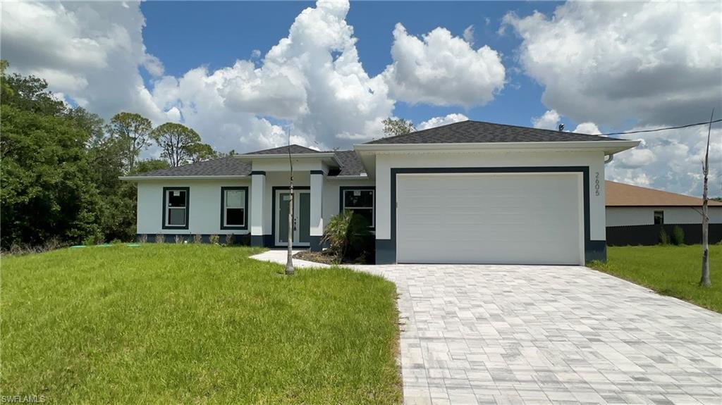 GREAT OPPORTUNITY! New construction 2025.Don’t miss the opportunity to buy the home of your dream in the city of Lehigh Acres,in a privileged location close to schools,shopping centers and just minutes from road 80 and I75.This beautiful home has a Modern architecture design and high ceilings.A spacious living surrounded by high impact windows and doors,wood kitchen cabinets with quartz countertop and new stainless steel appliances.Don’t wait any longer and make your appointment to see in person.