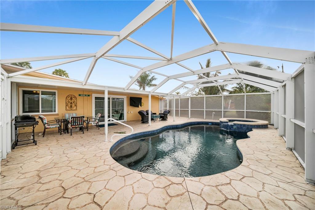 Step into your personal slice of paradise with this beautifully updated 3-bedroom, 2-bathroom pool home, perfectly situated near the Yacht Club and Cape Coral Beach. Whether you're dreaming of serene mornings by the pool or lively evenings hosting friends, this property delivers the ultimate Florida lifestyle. The heart of the home is its updated kitchen featuring sleek finishes and ample space for cooking and entertaining. Updated luxury vinyl flooring flows seamlessly throughout, adding warmth and style to every room. Hurricane impact doors and windows add a great level of safety and value to the property. This home is move in ready for any family looking to make this their home and will also make for a great investment property! Out back, your private oasis awaits. A heated pool and spa invite you to unwind year-round, surrounded by a generously sized patio perfect for sunbathing, BBQs, or evening cocktails under the stars. With the Yacht Club and Cape Coral Beach just moments away, you'll enjoy easy access to boating, waterfront dining, and sandy shores. This home is more than a place to live—it’s a gateway to the coastal lifestyle you've been dreaming of. Don’t wait and schedule a private tour today, your Cape Coral retreat is calling!