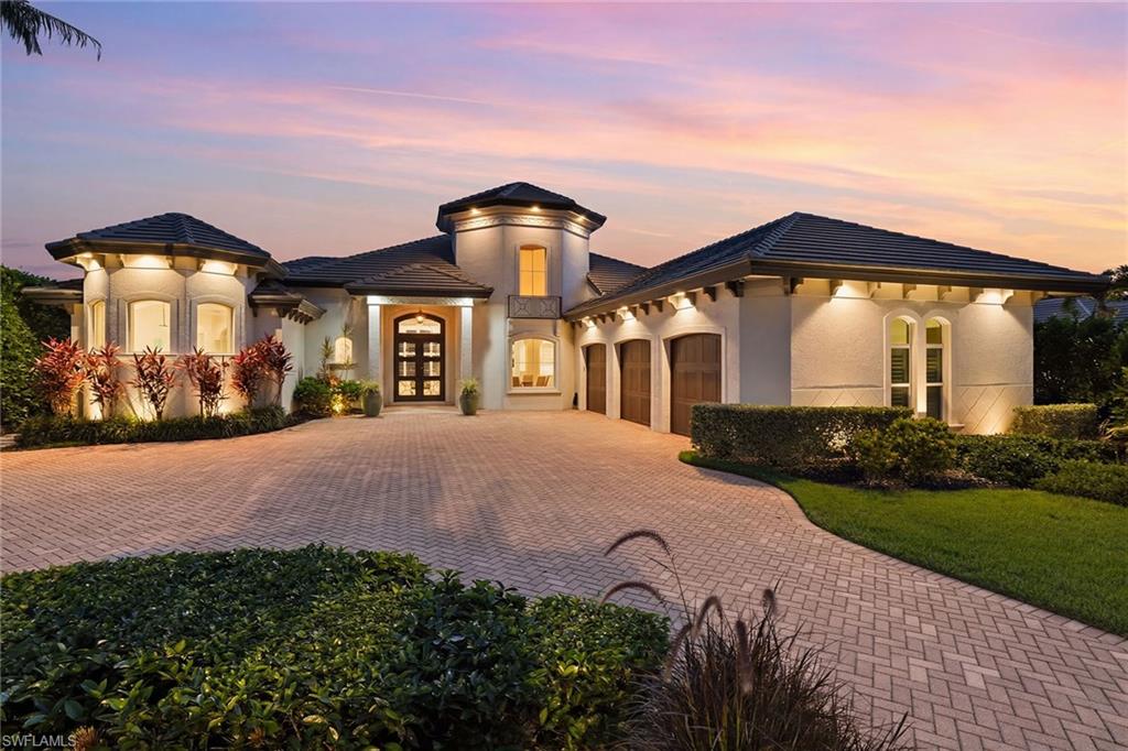 One or more photo(s) has been virtually staged, AI generated or rendered.  Welcome to this exceptional estate tucked away in the Vittoria neighborhood of Renaissance! This expansive single-level residence offers grand living spaces, thoughtful accommodations, and a seamless connection to the home's spectacular outdoor setting. Overlooking the 5th green with desired western exposure, the home enjoys exceptional privacy, sweeping golf course views and unforgettable Southwest Florida sunsets. A circular paver driveway, mature landscaping, and timeless architecture create an impressive arrival. Inside, soaring ceilings, custom millwork, beautiful archways, plantation shutters and engineered hardwood flooring complement the home's spacious design. Large windows and sliding glass doors fill the interior with natural light while framing the golf course views beyond. At the center of the home, the kitchen features custom cabinetry, premium appliances, ample island space and designer lighting, seamlessly connecting to the surrounding living areas. Multiple gathering spaces, including a formal dining room, great room, living room and wet bar, provide ample space for everyday living and entertaining. Within its wing, the primary suite serves as a private retreat complete with a generous sitting area and a well-appointed en-suite bath featuring dual vanities, a soaking tub and an oversized walk-through shower. Guest suites offer comfort and privacy and are thoughtfully positioned throughout the home. Zero-corner pocket sliding glass doors open to a sprawling covered lanai featuring a wood tongue-and-groove ceiling, a fully equipped outdoor kitchen, motorized screens, and multiple seating and dining areas. The custom gas-heated pool and raised spa are complemented by fire features, water accents and mature landscaping, creating an exceptional setting for year-round outdoor living. Additional features include impact windows and doors, an oversized three-car garage, a flat tile roof replaced in 2019, and a buried propane tank. Residents of Renaissance enjoy a premier lifestyle centered around the Arthur Hills Championship Golf Course, with golf memberships available immediately. Community amenities include a resort-style pool and pavilion, full-service spa and fitness center, six red clay tennis courts, pickleball, bocce and a vibrant social calendar.