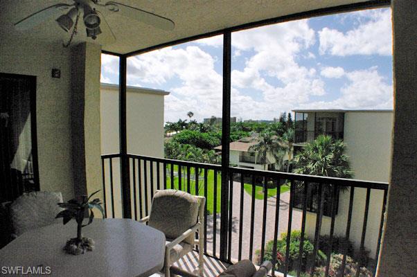 BEACH ACCESS ACROSS THE STREET TO BEAUTIFUL WHITE SANDY BEACH.  Best priced 2 bedroom 2 bath weekly rental Condo at Fairview Isles with convenience of onsite rental management.  Top floor unit, neat and clean and well maintained; so new owner can just walk in and enjoy.  Condo has energy efficient lighting in kitchen and baths and extra bulbs in storage unit.  New toilet in master bath.  New hardware on doors. Well maintained by owners.  Air conditioner is on an annual maintenance program that is offered to individual owners by the condo association.  Nice tile throughout wet areas including lanai.  Turnkey furnished.  You have the option to rent it or use the unit yourself.  Great location on south end Fairview Isles location.  Underbuilding Parking and storage space is included with condo purchase.  Also, plenty of room for bike storage.