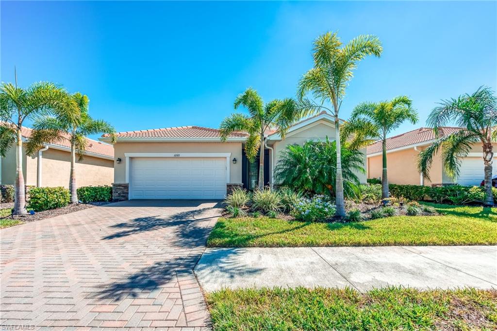 Feast your eyes on the “Snowbird’s Delight” in the most desirable 55+ community in the country! This lake view pool home is turnkey ready with upgrades galore. What upgrades you ask? The luxurious interior boasts crown throughout, 24-inch tile in all the common areas, Coretec LVT in the bedrooms, upgraded stainless appliance package, high level granite countertops with oversized kitchen cabinets, California closet systems, and plantation shutters, just to name a few. But what really elevates this home is the upgrades you cannot see. R30+ insulation coupled with a whole house dehumidifier allowing for extreme climate control and comfort all year round, a Kinetico water softener system, and a Moen Smart Home Water Security System. For safety it has an electric wind screen, metal pull down shutters, and a Ring doorbell w/camera system. Pelican Preserve amenities include 27 holes of championship golf with pristine greens and natural preserve surroundings, 12 pickleball courts, 8 tennis courts, bocce ball courts, outdoor & indoor pools, fitness center, movie theatre, library, outdoor amphitheater, and countless classes/events for everyone.