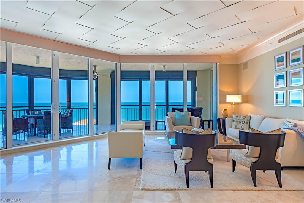 Breathtaking, expansive panoramic Gulf and Bay views await at the prestigious Seasons at Naples Cay, an iconic and exclusive enclave ideally situated just steps from Naples’ pristine beaches. This exceptional 11th floor, residence offers four-bedroom, four-and-a-half-baths and boasts 4,740 square feet of refined living space, thoughtfully designed to capture waterway vistas and abundant natural light throughout. A private elevator opens to a grand foyer, setting the tone for the dual living areas, formal dining room, and an impressive west-facing wraparound lanai—perfect for entertaining. The gourmet kitchen features a large island, high-end appliances including Sub-Zero, Gaggenau, and Thermador, two wine refrigerators, and a Miele coffee maker, seamlessly connecting to a relaxed family room surrounded by floor-to-ceiling windows. The split-bedroom layout ensures privacy, with each guest suite offering generous closets and en-suite baths; one guest bedroom, featuring a southern-facing balcony, can also function as a den or office and includes a wet bar and refrigerator. The expansive primary suite is a private retreat with Gulf views, a seating area, wet bar, dual walk-in closets, and a spa-like bath with a soaking tub, separate shower, and dual vanities. Residents of The Seasons enjoy an array of luxury amenities, including a resort-style pool, state-of-the-art fitness center, massage room, billiard room, guest suites, grill area, community room, on-site management, and 24-hour gated security. With private beach access and a prime location near Waterside Shops, Venetian Village, Artis–Naples, Mercato, and the cultural offerings of 5th Avenue South, this extraordinary residence offers the ultimate in coastal elegance and lifestyle.