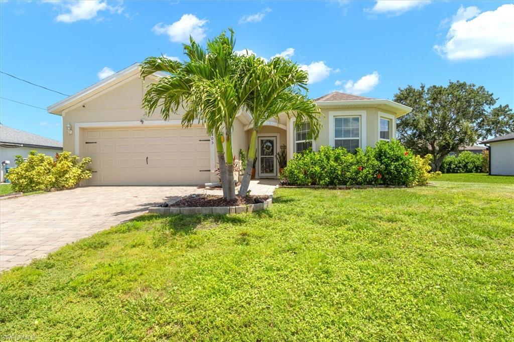 Welcome to this beautifully maintained, better than new, 3-bedroom, 2-bath pool home nestled in the desirable Northwest Cape Coral area. From the moment you step inside, you'll appreciate the high-end laminate flooring that flows seamlessly throughout the home and the fresh interior paint, creating a bright, coastal feel.

Step outside to your own private tropical oasis featuring a heated saltwater pool, lush landscaping, and a fully fenced backyard—perfect for relaxing, entertaining, or enjoying the Florida lifestyle year-round.

Additional upgrades include a reverse osmosis water system for added convenience and peace of mind. Located in an AE Flood Zone, this home comes with an assumable flood insurance policy of approximately $800 per year for future owners, offering exceptional long-term savings.

Whether you're searching for a full-time residence, seasonal retreat, or investment property, this move-in-ready home combines comfort, value, and outdoor living in one of Cape Coral's fastest-growing neighborhoods. Schedule your private showing today and start living the Southwest Florida dream!