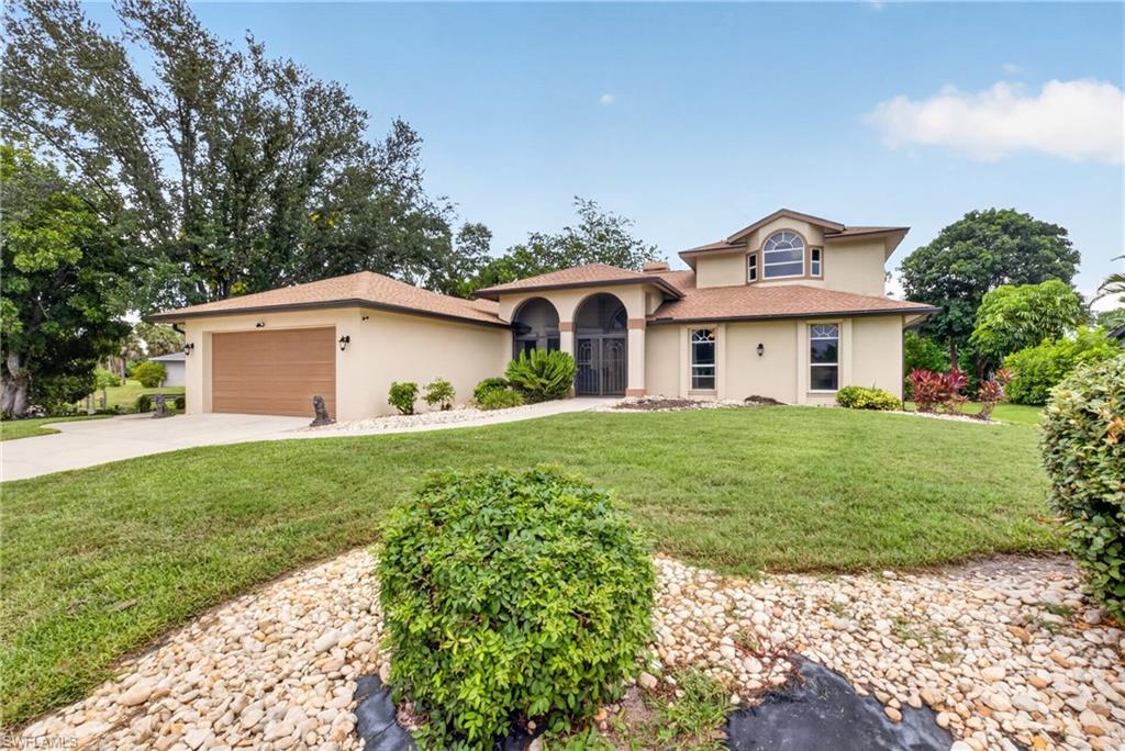 Welcome to your own private waterfront paradise in the highly desirable Riverbend community!** Perfectly positioned on an oversized cul-de-sac lot with approximately **234 feet of direct Gulf-access canal frontage** and a highly sought-after southern rear exposure, this exceptional residence captures the very essence of Southwest Florida living. Spend your days boating from your backyard, relaxing beside the heated pool, or entertaining under the expansive screened lanai while enjoying sunshine on your pool throughout the day. Offering generous living spaces, a thoughtfully designed floor plan with the primary suite and an additional guest bedroom on the main level, and two additional bedrooms upstairs, this home blends comfort, privacy, and functionality. Whether you're searching for a full-time residence, a seasonal retreat, or the ultimate waterfront lifestyle, this rare Riverbend gem delivers it all.
