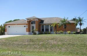 3 bedroom 2 bathroom home with a 2 car garage and a below ground pool. The kitchen has a pantry and breakfast bar and upgraded light fixture while the second and third bedrooms are good sized with nice bathroom. Cathedral ceilings, plant shelves, more upgraded light and fan fixtures, laundry room and large lanai/screened porch are make this a great deal for the money. Wonderfully convenient to Fort Myers, Immokalee and Labelle.