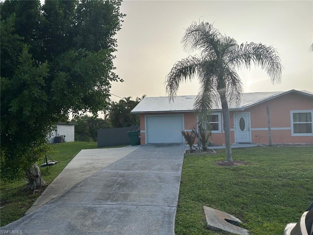 "A Nice 3-Bedroom Home in Coveted Naples Area with Spacious Backyard!"
One of the standout features of this home has to be the large and lushly landscaped backyard. Providing ample play space for kids or pets, it’s also the perfect retreat for alfresco dining or simply unwinding under the Florida sun. You will appreciate the attached garage with space for one vehicle, as well as additional room for storage. An over sized patio open to Huge backyard with fruit trees, fenced throughout, directly on the canal. As an added bonus, the property also features a versatile guest room that can serve as a home office, game room, or additional sleeping quarters for visiting family or friends.