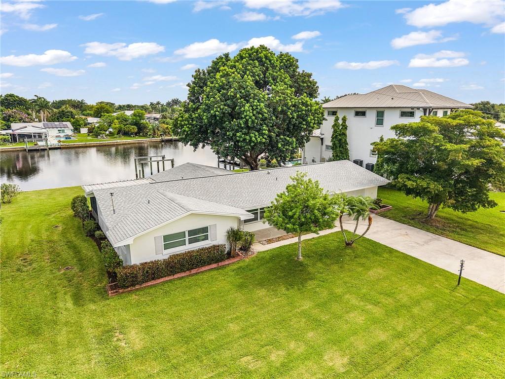 Welcome to waterfront living at its finest in the hidden gem of Yacht Club Colony. This beautifully maintained turnkey home offers 3 bedrooms and 2 baths, with the third bedroom currently serving as a spacious den or office.

The open-concept floor plan creates a warm and inviting atmosphere, perfect for entertaining or simply enjoying the relaxed Florida lifestyle.  Step outside and take in the beautiful water views while enjoying the privacy and prestige of being surrounded by million-dollar waterfront homes.  This home is offered Turn Key and move in ready.

Boaters will appreciate the deep-water canal, quick access to the Caloosahatchee River, and easy Gulf access. With plenty of room for your boat, jet skis, and other water toys, this property is designed for those who love life on the water. There’s even ample space to add a pool and create your own backyard paradise.

Yacht Club Colony is one of Southwest Florida’s best-kept secrets, offering a voluntary HOA, community boat ramp, waterfront park, gazebo, fire pit, horseshoe pits, and frequent sightings of dolphins, manatees, and native wildlife. Residents enjoy spectacular sunsets, a friendly atmosphere, and convenient access to I-75, downtown Fort Myers, shopping, dining, beaches, and waterfront restaurants.

Whether you’re looking for a year-round residence, seasonal retreat, or boater’s dream home, this property offers the perfect combination of location, lifestyle, and value. BONUS: Transferable Flood insurance available.