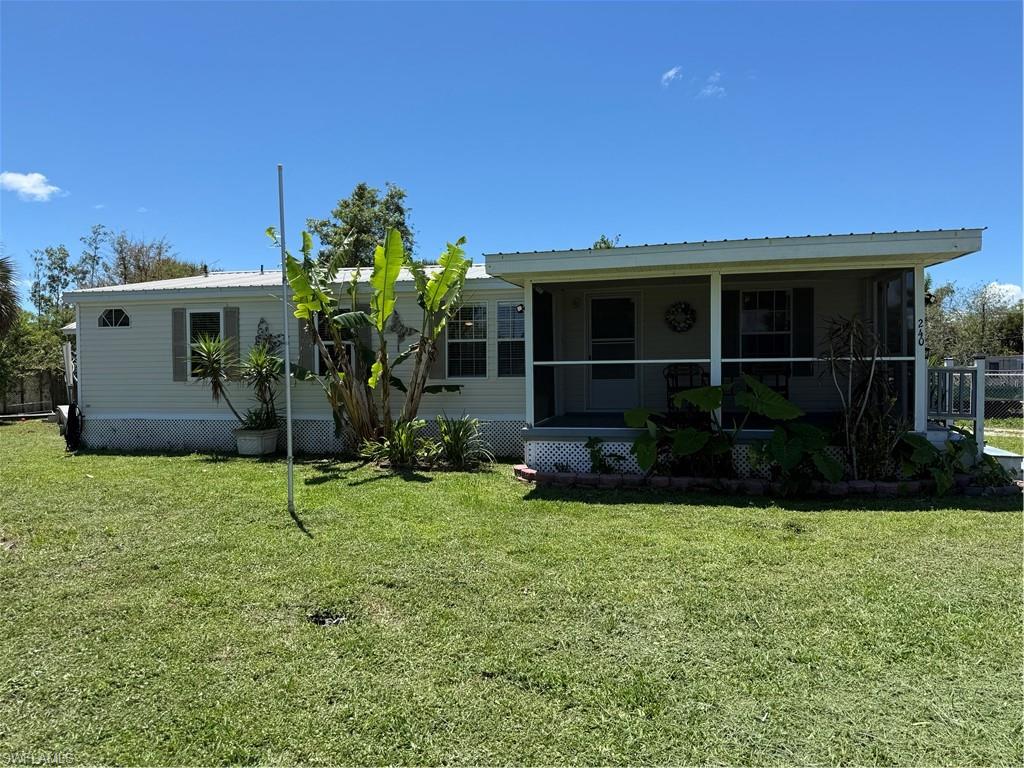 Welcome to 240 McBeth Way, a well-maintained 3-bedroom, 2-bath manufactured home offering 1,536 square feet of comfortable living on a fully fenced 9,583 sq ft lot. Tucked away in the quiet community of Copeland, you're just 5 minutes from the gateway to the Ten Thousand Islands and the Stone Crab Capital of the World — a true angler's dream where you can keep your boat right on the property.
Inside, a split-bedroom floor plan provides privacy and functionality, with a bright Florida room, screened lanai, and a dedicated workshop adding versatile bonus space. The kitchen features a breakfast bar, pantry, and family dining area, while built-in cabinets and inside laundry add everyday convenience. Stay comfortable year-round with central heat and air, ceiling fans, and a whole-home water softener.
Additional highlights include a metal roof, aluminum siding, storage structures, and a deck and patio perfect for enjoying the peaceful, landscaped surroundings. With no HOA, no gated restrictions, and quick access to Big Cypress National Preserve and Fakahatchee Strand Preserve State Park, this property is ideal for outdoor enthusiasts, fishermen, and anyone craving an authentic Old Florida lifestyle.
Don't miss this rare opportunity — schedule your private showing today!