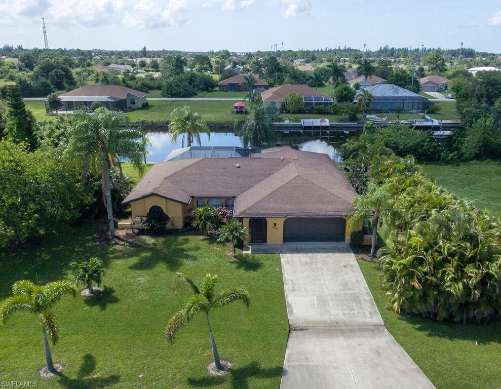 Waterfront 3 lot site with Southern Exposure, Saltwater Pool & Spa added in 2014, concrete boat dock on an extra wide canal for great views and sunsets.
This home has new kitchen, new baths, new flooring, new paint and can be sold turn key, just bring your toothbrush.
Great location in the Burnt Store / Pine Island Rd. corridor, close to several area parks, schools and shopping. Minutes from Coral Oaks Golf Course, and the public Gulf Access Boat Ramps on Burnt Store Rd.
Granite counters, Tiled floors in all living areas, carpeted bedrooms. Extra Large screened Lanai area for all your outdoor entertaining. Custom built Heated Saltwater Pool & Spa with remote controls and automation for operational ease.
Great fishing in the back yard for Bass & Bluegills and you may even catch sight of the family of otters that live in the area.
Get your piece of paradise while you can, this is priced to sell, call for your exclusive showing appointment today.