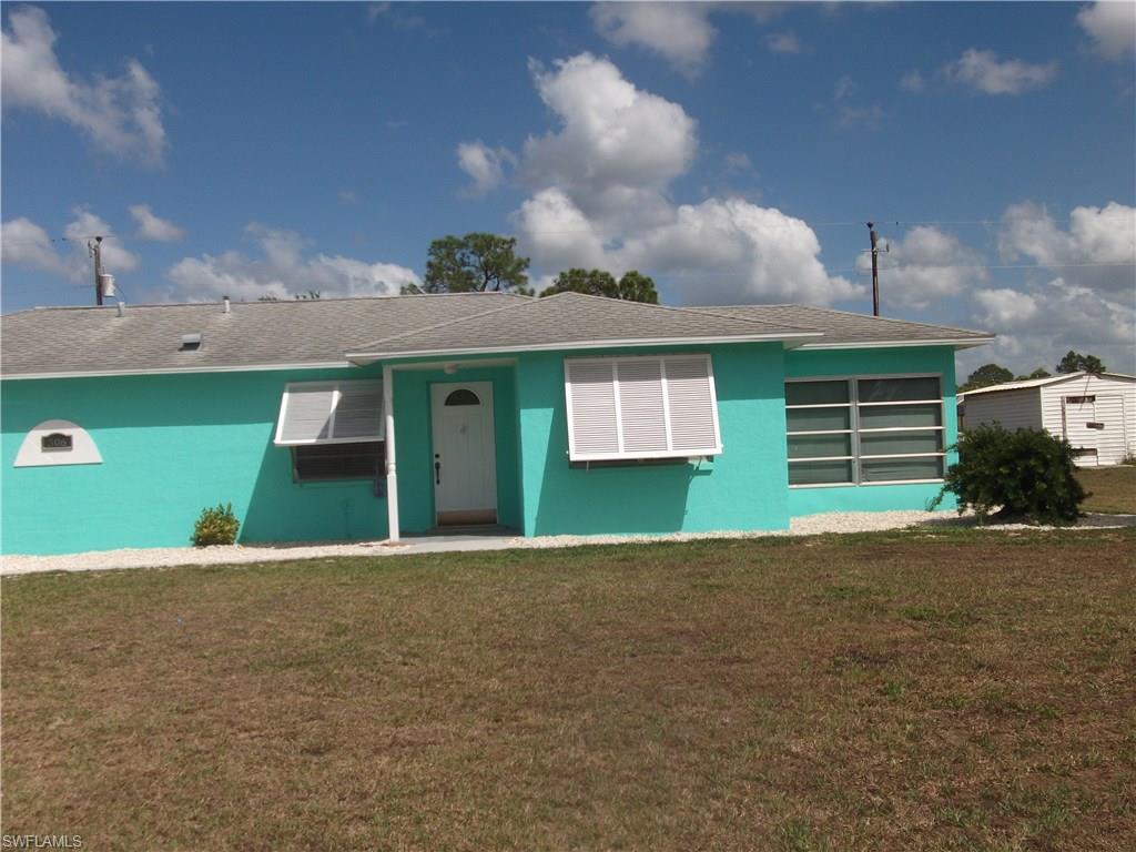 What a Gem!! Freshly painted. Tile and wood laminate. Very cute and ready for new owners. Great Neighborhood, quiet and close to everything. Walking distance to Lehigh Acres Elementary. Nice appliances and a one car garage, Florida room and lanai. Pack up and get ready to move in.