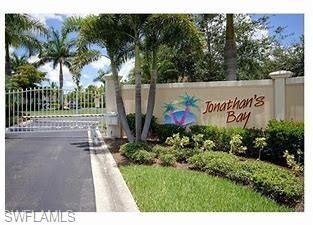 Stunning four-bedroom, 2 bath condo in prestigious Jonanathan's Bay!  Only a short drive from RSW Airport and minutes away from downtown Fort Myers and Bonita!  This beautiful, remodeled unit is being offered fully furnished  and turn-key!  Imagine enjoying your morning coffee on your spacious lanai overlooking the tranquil fountains in Jonathan's Bay.  This exquisite home is ready and waiting for you!