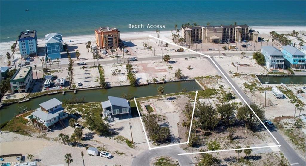 Build Your Dream Waterfront Retreat on Fort Myers Beach! Discover the ultimate in coastal living with this oversized, DIRECT GULF ACCESS lot perfectly situated in one of the most desirable locations on Fort Myers Beach. Boasting an impressive 100 FEET OF CANAL FRONTAGE, this rare property provides a quick and direct route to the sparkling waters of the Gulf, making it a boater’s paradise. Just STEPS FROM BEACH ACCESS — less than 100 yards away — you’ll enjoy effortless days spent basking in the sun, strolling along soft sandy shores, and taking in the laid-back charm that defines life on the island. This prime homesite is the perfect blank canvas to build your custom dream home in the vibrant, reimagined community of Fort Myers Beach. With a BRAND-NEW REINFORCED SEAWALL already in place, your investment is protected and ready for your vision to take shape. As evening falls, take in breathtaking sunset views over the Gulf of Mexico — the kind of moments that make every day feel
like a vacation. Embrace the beauty, serenity, and exclusivity of coastal living at its finest. Opportunities like this are truly rare — secure your slice of paradise today.
