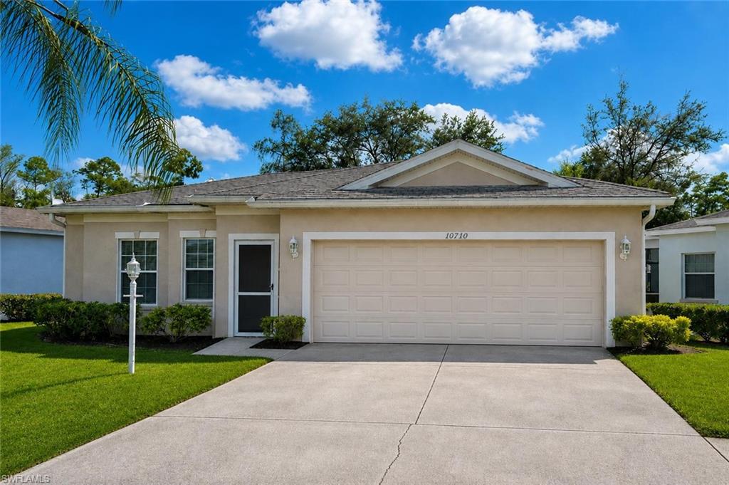Welcome to your new home in the desirable gated community of Island Club at Corkscrew. This well-maintained 2-bedroom, 2-bath residence offers a bright and open split-bedroom floor plan with vaulted ceilings, tile and carpet flooring, and abundant natural light. Enjoy a spacious living area, formal dining space, and a functional kitchen equipped with all major appliances. The home also features an attached 2-car garage, a laundry area, and a screened lanai overlooking a peaceful, landscaped setting.

Residents enjoy access to community amenities including a clubhouse, pool, tennis courts, and more. Conveniently located near shopping, dining, entertainment, and major roadways. Rent includes cable, irrigation water, and lawn maintenance. Pets considered with owner approval.