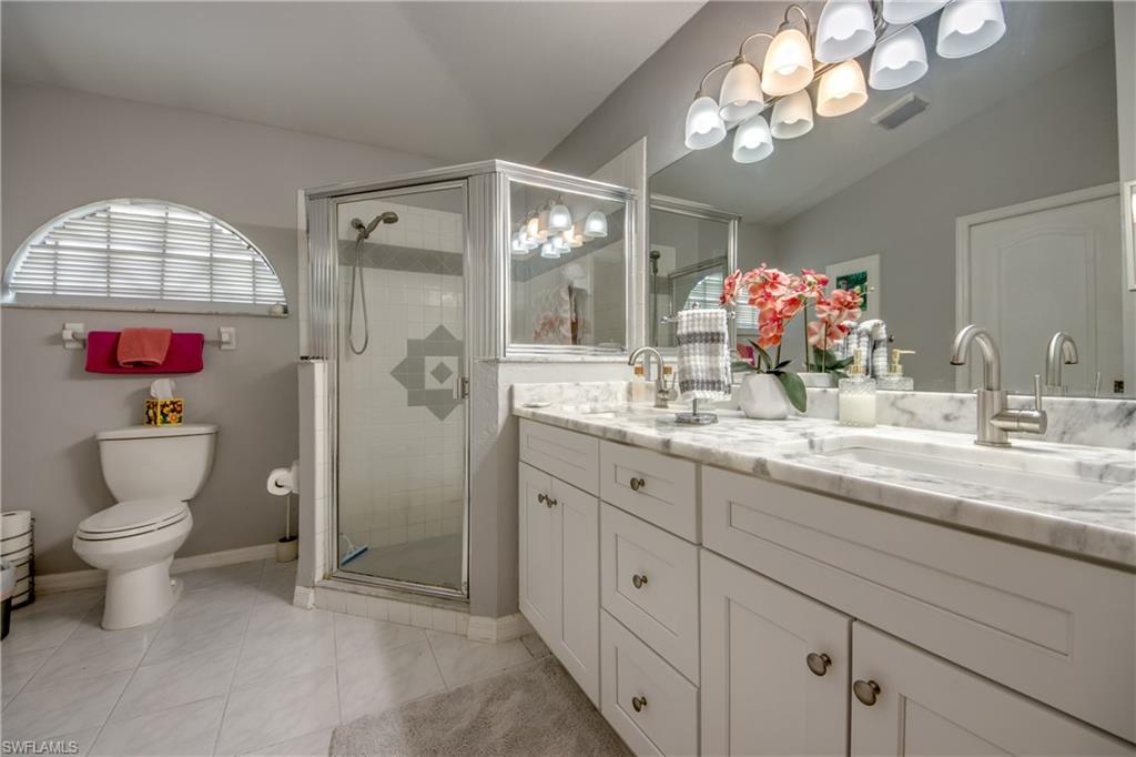 THIS IS HOW SMART BUYERS GET INTO GREAT NEIGHBORHOODS! SOMETIMES THE SMARTEST HOME TO BUY ISN’T THE ONE THAT HAS ALREADY BEEN UPDATED…IT’S THE ONE THAT GIVES YOU THE OPPORTUNITY TO MAKE IT YOURS. This is the kind of opportunity SAVVY BUYERS look for—a great location, a well-maintained home with the freedom to make it their own and a GREAT PRICE. The neighborhood is already established, the home is move-in ready, and you can update the cosmetic finishes over time as your budget and personal style allow, creating sweat equity with every improvement. Built in 1993, this well-maintained CONCRETE BLOCK home offers 1,744 square feet of living area with 3 BEDROOMS, 2 BATHROOMS and a 2-CAR GARAGE. Natural light fills the home and CATHEDRAL CEILINGS are carried out in every room. This home has been lovingly cared for through the years and, while many of the finishes are original, they have been well maintained. Primary bathroom has received a tasteful update with a white and gray marble counter, shaker-style cabinetry and updated fixtures, offering a glimpse of how easily this home can be transformed into something truly special. MANY great features like a METAL ROOF, REPLUMBED WATER LINES, POCKETING SLIDERS and a HURRICANE-REINFORCED GARAGE DOOR. Storm protection is already in place with a combination of ACCORDION SHUTTERS, MANUAL HURRICANE SHUTTERS and a MANUAL KEVLAR ROLL-DOWN SHUTTER protecting the lanai, providing valuable peace of mind during storm season. Step outside and you’ll discover a beautiful oasis—a LARGE, PRIVATE, LUSHLY LANDSCAPED BACKYARD with SOUTHERN REAR EXPOSURE, offering sunshine on your future pool all day long. There’s plenty of room to add the custom pool you’ve always envisioned while still enjoying exceptional privacy created by mature landscaping. Southwest Cape Coral continues to be one of the city’s most sought-after locations because of its established neighborhoods, beautifully maintained homes, nearby parks, library, excellent boating access, outstanding restaurants, shopping and convenient access to both Cape Coral and Fort Myers. Whether you’re headed to waterfront dining, enjoying nearby Gulf beaches, spending the day on the water or simply taking an evening walk through the neighborhood, it’s easy to understand why so many people choose to call Southwest Cape Coral home. Even better, this property is located in a NO FLOOD ZONE, so flood insurance is not required by most lenders. CITY WATER AND SEWER are in place with ALL ASSESSMENTS PAID, there is NO HOA and the neighborhood is both PET FRIENDLY and RENTAL FRIENDLY. FHA and VA financing are welcome, making this one of the best opportunities currently available for buyers looking to purchase a solid home in a fantastic neighborhood at an affordable price. If you’ve been searching for a home with great bones, an outstanding location and unlimited potential, this may be the opportunity you’ve been waiting for. Your Pinterest board just found its perfect starting point!