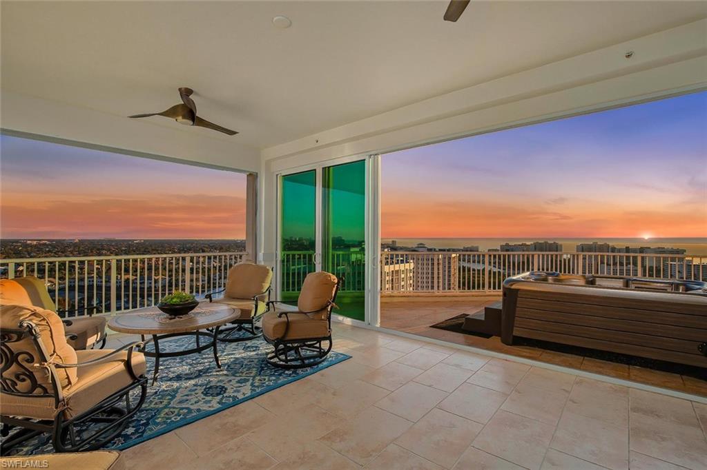 KING OF THE HILL! VIEWS VIEWS VIEWS! Enjoy expansive and towering views all the way South to Downtown Naples and North to Sanibel Island with this rarely available Penthouse in the Sky.  If you are looking for the Most Grandiose Luxury Residence in The Dunes, you have finally found it!! Nearly 6,000 Sq. Ft. of Spectacular Luxury Penthouse Living, with an Outdoor Rooftop Balcony and private Hot Tub overlooking the Gulf of Mexico, Custom All Glass Old Style Florida Room, and unforgettable views from every room.  Custom Italian Marble throughout the main living areas, extra high Penthouse only ceilings, custom built in woodwork, wet bar in one of 2 Master Suites, theater, and a 2.5 Car Private Garage (can fit 3 cars) with an additional prime parking spot, extra storage, and SO much more!   At just under 6,000 sq. ft., this luxury Penthouse is an exceptional value when comparing price/ sq. ft. of other Penthouse properties in town.   Truly an amazing investment for those who want to move in and enjoy an exceptional lifestyle, or renovate to their own flavor.  Brand New State of the Art Clubhouse awaits with amazing amenities, active tennis program, and social atmosphere. Pet friendly.
