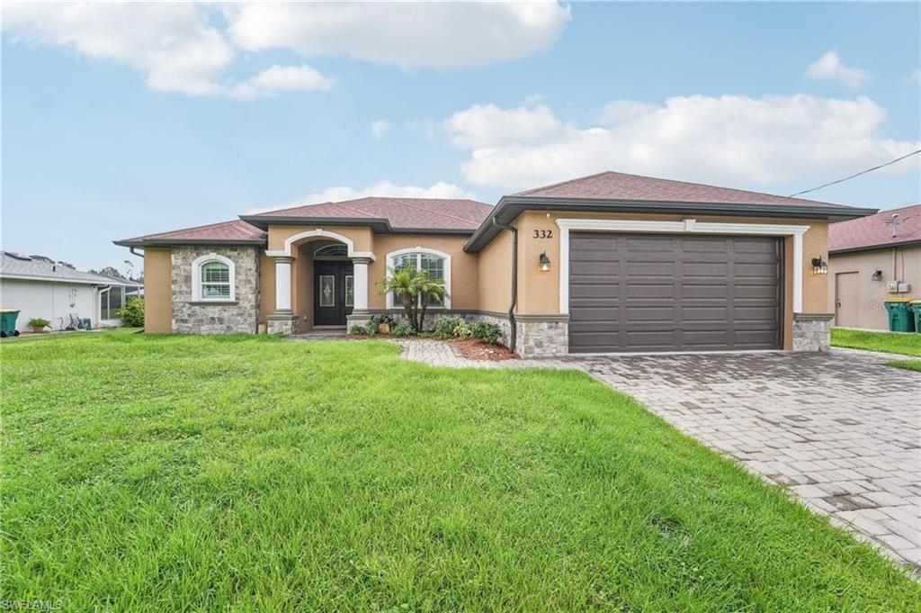 TURNKEY WATERFRONT PARADISE — NO FLOOD ZONE! Welcome to 332 McCabe St, a stunning modern Mediterranean oasis built in 2019, offered fully turnkey and beautifully furnished! Located in a highly desirable NO FLOOD ZONE (saving you thousands on insurance), this 3-bedroom, 2-bathroom, and a den, 1,973-sqft home is the ultimate move-in-ready Florida retreat. Boating enthusiasts will fall in love with the direct Gulf-access waterfront featuring a private backyard dock and boat lift on the canal. Step inside to a bold, high-contrast interior showcased by striking black-and-white checkered tile flooring, crown molding, and an open-concept layout flooded with natural light. The gourmet kitchen boasts pristine white shaker cabinets, dark premium countertops, stainless steel appliances, and a breakfast bar. Conveniences abound throughout the home, including a built-in central vacuum system and an oversized garage with plenty of storage for your water toys. Retreat to the luxurious primary suite, offering elegant tile floors and a spa-like bath with a soaking tub and walk-in shower. Outside, your private paradise awaits on the expansive, screened lanai, complete with a heated pool and integrated spa overlooking the canal. Whether you are launching your boat from your backyard lift for a day on the Gulf, relaxing in the spa, or enjoying the peace of mind of a no-flood-zone luxury build, this home has it all. Schedule your private tour today and start living the dream tomorrow!