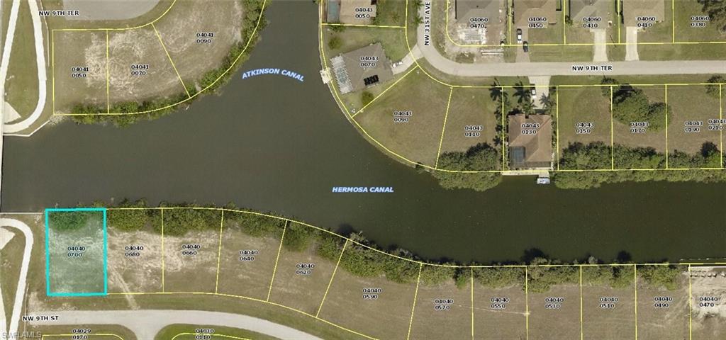Spectacular freshwater homesite in desirable NW Cape Coral! This oversized opportunity is located in Unit 56 on a wide freshwater canal, positioned just off the canal intersection to create an even more expansive water view. Tucked away at the end of a quiet dead-end street, you'll enjoy added privacy with minimal traffic. Whether you're ready to build your dream waterfront home or secure a prime investment for the future, this lot checks all the boxes. Conveniently located just north of Tropicana Parkway and only minutes from Burnt Store Road, you'll have easy access to both the Pine Island Corridor and Port Charlotte, along with nearby shopping, dining, parks, golf, and everyday conveniences. Freshwater lots with views like this are becoming increasingly difficult to find—don't miss your chance to own a piece of Southwest Florida paradise!