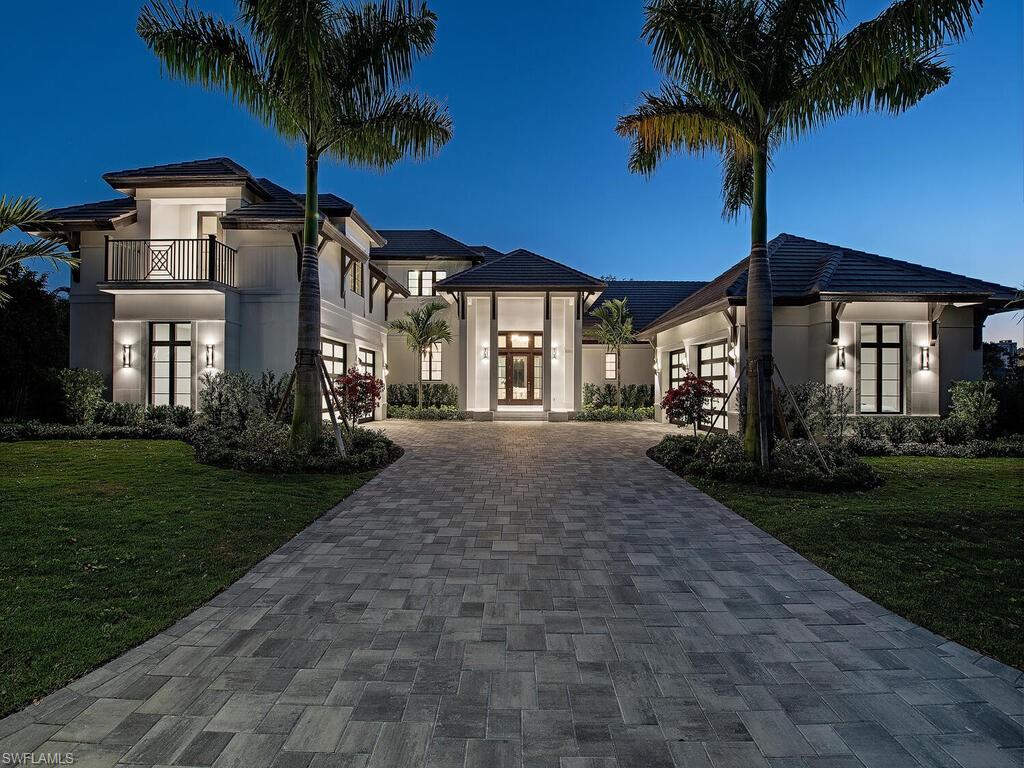 Classical architectural elements viewed through a contemporary lens yields a timeless residence; The Hideaway. Perfectly positioned on a quiet, southern exposure, cul-de-sac oversized site this Matt Kragh design/Werchek Dev. home exudes sophistication yet a casual ambience. Gracious Great Room design with a fabulous gourmet kitchen offering significant custom cabinetry and top tier appliance package. Incredible Master Bedroom offers a large sitting room, luxurious Master Bath, closets that set the standard, morning coffee bar, and an owner's full Laundry Room. Large Study, generous Guest Casita and true four stall garage are also on the ground level. Fantastic bar and wine room complete the entertaining opportunity. The outdoor space is unequaled in the marketplace with a large covered living area protected by roll-down screens/shutters, flanked by an outstanding pool/spa area bathed in the southern sun year around, and resort-worthy landscape lighting and fire features for evening enjoyment. There are two Guest Suites on the second level, a game room, and a bonus loft area. This may represent the last opportunity in Pelican Bay for a home of this stature.