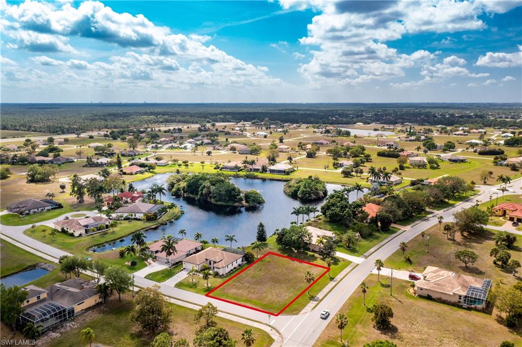 Fantastic opportunity to own this CORNER LOT with LAKE VIEW beautiful Burnt Store Lakes. With a southern rear exposure view and located on one of the most favorite lakes within the community, be prepared to enjoy watching White Ibis coming in to roost in the evening on the lakes center island. Also what makes this lot especially special is the green space to the south of this lot providing good separation and privacy from you and your neighbor and you’ll also find sidewalks for your leisurely morning and evening strolls through the neighborhood. Homes on both sides of the home are already built so there will be no future next door construction. Public utilities are already in place in the Burnt Store Lakes community which makes this lot an exceptional value! Burnt Store Lakes is a beautiful deed-restricted community with many new custom construction homes currently being built throughout the community. As a Burnt Store Lakes resident, you can leisurely kayak or canoe on the lakes and enjoy the multitude of tropical birds that share this naturalistic setting! Enjoy Burnt Store Lakes' park with playground and kayak/canoe launch to Charlotte Harbor.
