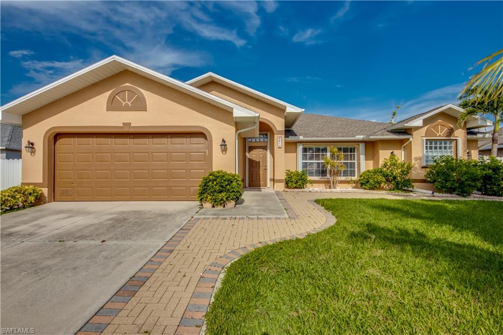 ***Motivated Seller, Priced to Sell***BEAUTIFUL WESTERN EXPOSURE POOL HOME located in the highly desirable SW Cape Coral.  Immaculate maintained 3 bed, 2 bath home boasting over 1800 square feet.  Home features tile floors throughout, solid wood cabinets in the kitchen complimenting the black granite countertops and stainless steel appliances.  The open floor plan and spacious bedrooms make a great place for hosting guests or for families.  The 32’ heated salt water pool is surrounded by travertine tile.  Enjoy sitting in your hot tub enjoying the beautiful SW Florida sunsets! Have fun in the large fenced yard that includes a pavered side yard behind the gate perfect for parking your boat or trailer.  Every opening in the house is covered w/ accordion hurricane shutters. HVAC system w/ air purifier keeps out allergens. New roof in March 2022. No flooding from Hurricane Ian. Assessments in and paid. From County: Proposed tax bill $5393, if no changes they'll be $4823.