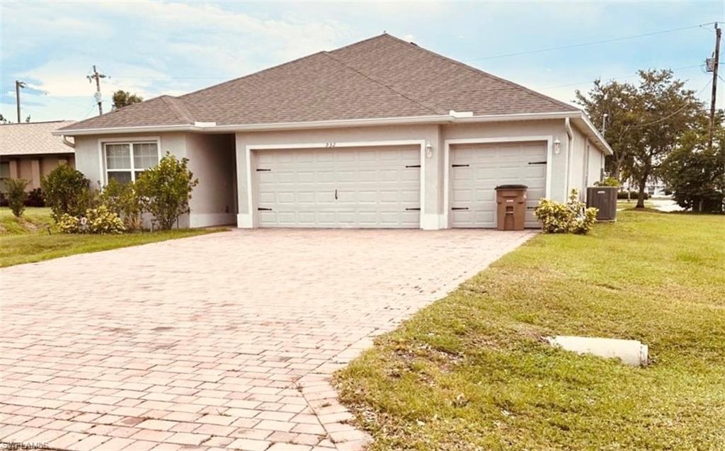 Step into this beautifully maintained 4-bedroom, 3-bathroom home featuring a spacious 3-car garage and over 2,000 square feet of thoughtfully designed living space in a sought-after Cape Coral neighborhood near Skyline, Trafalgar and Pine Island. with ALL ASSESSMENTS PAID! This inviting residence offers a bright and open layout with modern finishes throughout, including stylish white cabinetry, quartz countertops in the kitchen, solid surface bathroom vanities, stainless steel appliances, and durable tile flooring throughout the main areas and bedrooms. The home also features tiled showers, window treatments throughout, a covered lanai ideal for relaxing or entertaining, paver driveway, irrigation system, dimensional shingle roof, and an automatic garage door opener. Conveniently situated near schools, shopping, restaurants, and everyday amenities, this move-in ready property combines comfort, functionality, and location all in one exceptional package.