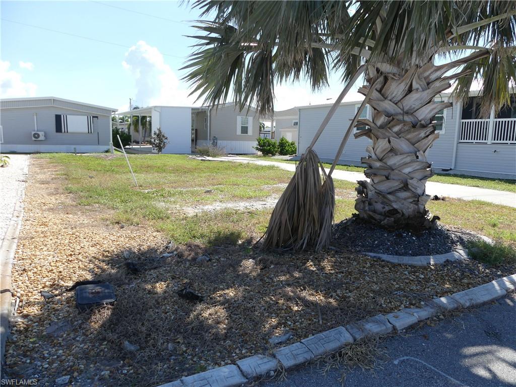 Ideal location.  This lot is only four lots away from the clubhouse, pool, and boat ramp.  You can walk to all of these very quickly.  The community has many amenities.  Boat ramp, clubhouse, pool, hot tub, bocce ball, pickle ball, dog park, picnic area, and boat or motorhome storage for just $50 a year.  Mobile was demolished so big savings on impact fees.