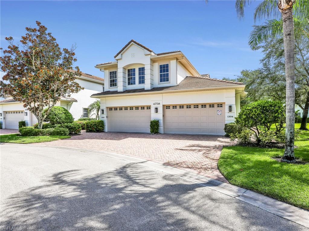Experience effortless living in this updated first-floor coach home in Wellington Place at Kensington Golf & Country Club. Offering 2 bedrooms plus a versatile den, 2 bathrooms, and a spacious two-car garage, this coastal contemporary residence combines timeless style with an exceptionally flexible floor plan designed to adapt to your lifestyle. Warm wood-look tile flooring flows throughout the home, complemented by plantation shutters, soft neutral finishes, and an abundance of natural light. The open-concept kitchen is thoughtfully designed with quartz countertops, a center island, built-in breakfast seating, and seamless connectivity to the surrounding living spaces. Pocketing sliding glass doors extend the living area to the screened lanai, where tranquil lake views create the perfect backdrop for morning coffee or evening relaxation. The flexible layout offers multiple options to suit your needs. The den is currently furnished as a guest bedroom, while the formal dining room is being utilized as a home office, providing exceptional versatility for remote work, hobbies, or additional guest accommodations. The spacious primary suite overlooks the lake and features a generously sized bathroom with dual vanities, a soaking tub, walk-in shower, and newly installed countertops—the home's most recent update. A private guest bedroom and full bath offer comfort and privacy for family and visitors alike. Ideally situated within the community, this residence enjoys convenient proximity to the neighborhood clubhouse, resort-style pool, and fitness room while maintaining a peaceful, private setting away from the activity. Located in the prestigious Kensington Golf & Country Club, this exceptional coach home places you just minutes from Naples' renowned beaches, Waterside Shops, Mercato, Old Naples, fine dining, shopping, and everyday conveniences. Golf membership is optional, allowing you to enjoy the Kensington lifestyle with the flexibility to choose the membership that best suits your needs.
