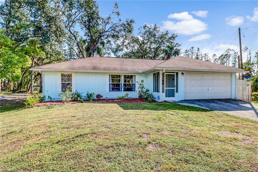 Lovely 3/2 Single Family home in an ideal location in Golden Gate Estates! Enjoy the peace and quiet of Estates living while conveniently located right off of Collier Blvd, minutes from Pine Ridge Rd! Less than a mile from the grocery store, restaurants, gas stations, pharmacy, schools, etc. This home features a bright and open floor plan with cathedral ceilings and oversized windows that make the home feel nice and spacious! This home has split bedrooms, 2 car garage, and many updates. Beautiful backsplash in the kitchen, fresh paint throughout, and updated master bathroom with an oversized soaking tub and new vanity! This home is on a beautiful cleared out lot with tons of room for your little ones & pets to run around! This home wont last long at this price & location! See it today, before it's too late.