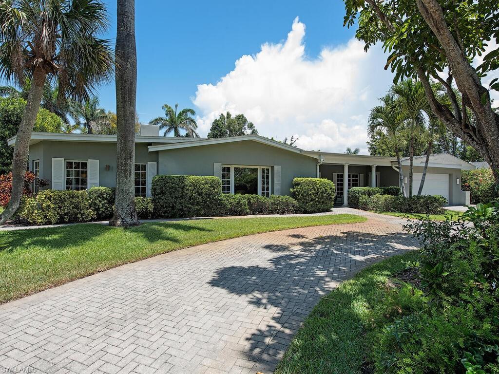 H8464 - Move right in! This home is located a few blocks to the beach at Lowdermilk Park on a quiet street in Coquina Sands. The property is in the preferred X zone ("high & dry").  Great floorplan with 5 bedrooms/5 baths PLUS attached guest suite/office/den. Pool house has vaulted ceilings. Thoughtfully designed, the features include a beautiful white quartz gourmet kitchen, living room with fireplace, skylights throughout, white plantation shutters & travertine marble flooring in the main areas. This is a unique & special home & is one of a kind. In addition, there is a large private 36 x 18 screened, heated pool surrounded by a large deck with slate flooring and lush landscaping. French doors open up from the home & the guest apartment to the pool area. This wonderful home has been substantially improved & expanded:  new roof & windows and a large separate guest apartment with bath & private entry. Additions also include a 2 car garage, formal dining room, totally renovated kitchen, bedroom, bath. Pectin Rd. is in between Mandarin Rd. & Banyan Blvd. with only 2 homes on the street. This is a hidden gem in a wonderful neighborhood.