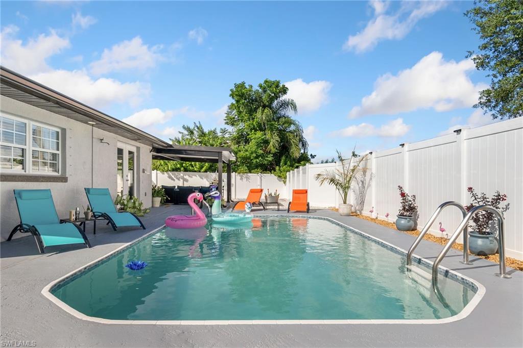 FULLY FURNISHED | TURNKEY AIRBNB | PRIVATE POOL OASIS

Welcome to your own private Florida retreat! This beautifully renovated, fully furnished, and move-in-ready 3-bedroom, 2-bath pool home offers the perfect blend of comfort, style, and proven income potential. Currently operating as a successful short-term rental, this turnkey property is ideal as a primary residence, vacation home, or investment opportunity.

Inside, you'll find a bright open-concept layout featuring luxury vinyl flooring throughout, modern LED lighting, granite countertops, stainless steel appliances, and beautifully updated bathrooms. Every space has been thoughtfully designed and furnished to create a warm, inviting coastal atmosphere.

The true highlight of this property is the backyard oasis. The fully fenced outdoor space features a sparkling private pool, expansive sun deck, tropical landscaping, and a new metal entertainment pavilion that creates an incredible extension of the home's living space. Enjoy outdoor lounge seating, a pool table, grilling area, and multiple gathering spaces designed for entertaining and year-round Florida living.

Whether you're relaxing poolside, hosting family and friends, or welcoming vacation guests, this home delivers the indoor-outdoor lifestyle that makes Southwest Florida so desirable.

Recent improvements include a 2024 roof, updated kitchen appliances, remodeled bathrooms, luxury vinyl flooring, modern LED lighting, fresh interior finishes, and a newly added outdoor entertainment area.

Conveniently located near shopping, dining, golf courses, boating, waterfront attractions, hospitals, and Southwest Florida's beautiful Gulf beaches. With its established rental history, exceptional outdoor amenities, and furnishings included, this move-in-ready property offers a rare opportunity to own a fully turnkey Florida getaway with outstanding income potential.