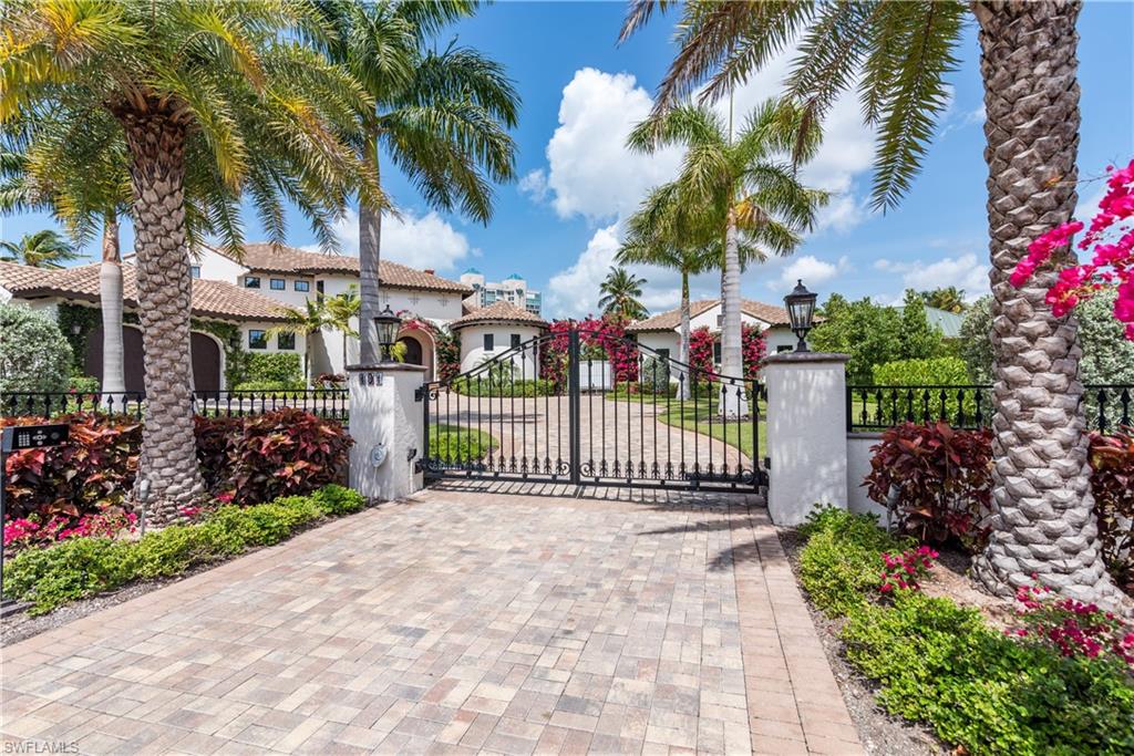A vision was created with over 5,000 sq. feet of ambiance, located near the Gulf on a canal in Naples ! A grand home with land and an extra building lot in the Seagate Community. Lightly visited by the owner, with a European feel of old-world. This stunning two level with the master suite on the first floor, en-suite bedrooms, and baths on the second level. An elevator provided for convenience. To top it off a private family room and deck for guests as well. An additional three-car garage with room for a lift and bathroom attached. This breathtaking property has it all from a home, land, boating, beach, and car/motorhome/ boat space. The gated beach club is positioned between the growing attractions of North Naples, Mercato, the village, Waterside shops and the historic charm of Downtown. At the end of a cul de sac on one of Seagate’s four quiet, picturesque streets and only ninety homes. One will experience pure tranquility when overlooking canal views, wildlife, sea life and astonishing daylight or sunsets. Seagate is a beach and boating community. Enjoy riding your bike or taking a stroll to the beach for the SouthWest famous sunsets!