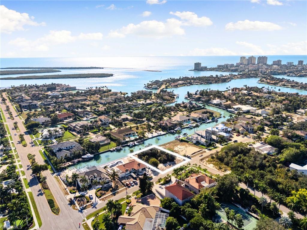 This is your chance to build your dream home on Marco Island! With direct access to the gulf this property is a boater's dream. With 125 ft of pristine canal waterfront just minutes away from open water! This property features mature trees throughout and has a seawall in place. Don't miss your chance to get your own slice of paradise.
