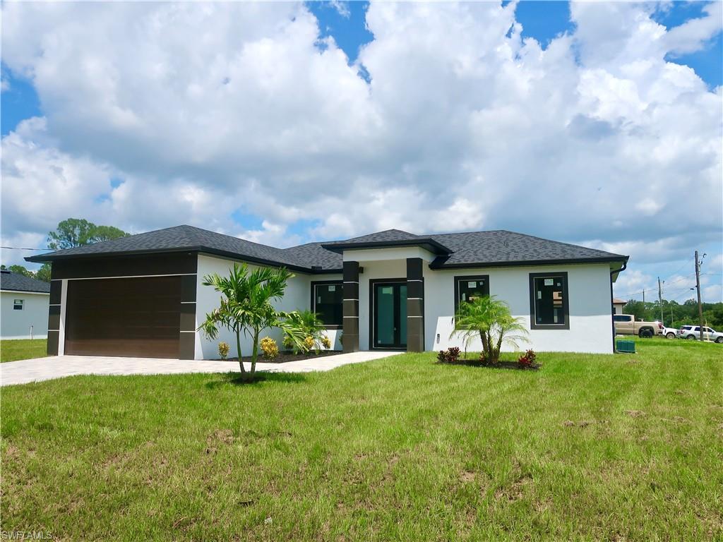 GREAT OPPORTUNITY! New construction 2025.Don’t miss the opportunity to buy the home of your dream in the city of Lehigh Acres,in a privileged location close to schools,shopping centers and just minutes from road 80 and I75.This beautiful home has a Modern architecture design and high ceilings.A spacious living surrounded by high impact windows and doors,wood kitchen cabinets with quartz countertop and new stainless steel appliances.Don’t wait any longer and make your appointment to see in person