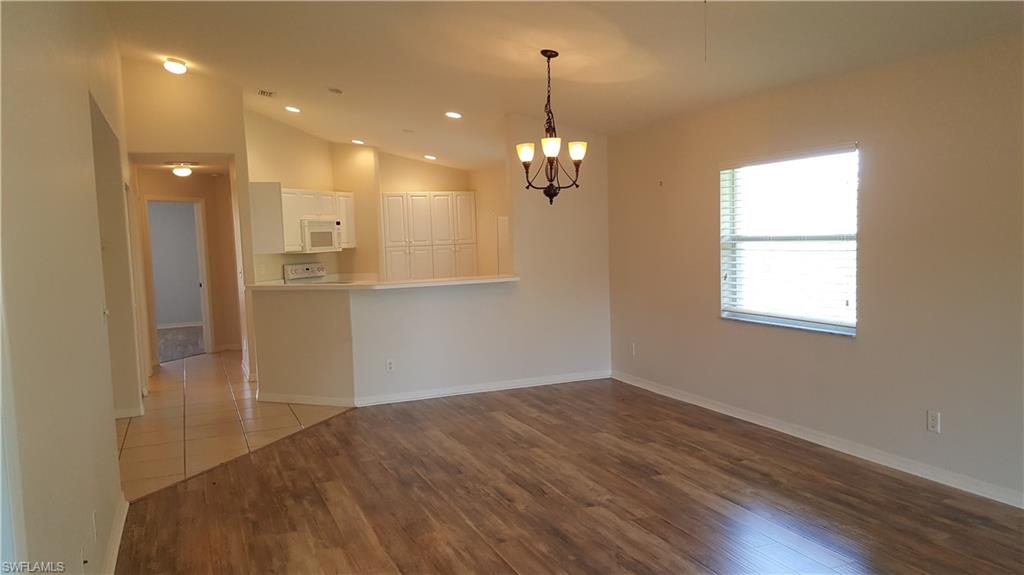 Move in condition! Nice bright 3/2 with detached garage second floor condo. Newer appliances, breakfast bar and cathedral ceilings. Great community with community pool. There are guest parking spaces available. The washer and dryer are on the screened lanai. Easy commute to Bonita schools and shopping. A short walk to the YMCA just across the road. Bonita Springs beaches are minutes away. Residents can also join the nearby City of Bonita Springs Recreation Center that sits on 41.9 acres of land which is located at 26740 Pine Avenue off of West Terry Street and has something for everyone. The facility includes a full-sized gymnasium, a cardiovascular/fitness room, skate park, community pool, softball fields, public tennis courts, disc golf course, picnic areas and a playground.
