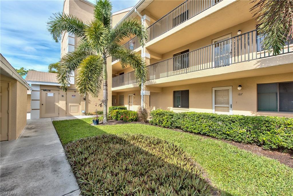 Unpack and Move In! A truly unique floor plan that will Wow you! This condo welcomes you with an expansive lake and golf course views. A beautifully updated kitchen with superior cabinetry, granite and stainless steel appliances and breakfast area. With almost 1,800 sq.ft of living area you will find 3 bedrooms each having their own bathroom. All bathrooms have been updated. On the main level you will find one guest room and one master suite with sliders to the lanai which have also been enclosed for extra living space or you can open the sliders. Ready to explore the lower level? Where you will find another master suite with its own private living room that can be used in many ways. Off this living area is the other master suite with another lanai. From new laminate flooring, wine cooler, A/C, hot water heater and appliances that have all been recently replaced, nothing let do here and it's being sold partially furnished. Included with a carport and storage. Breckenridge offers bundled golf, tennis, 5 pools, pickeball, water volleyball, exercise facilities, card games and so much more. Minutes to fine dining, golf and more. RSW Airport and beaches are short drive away.