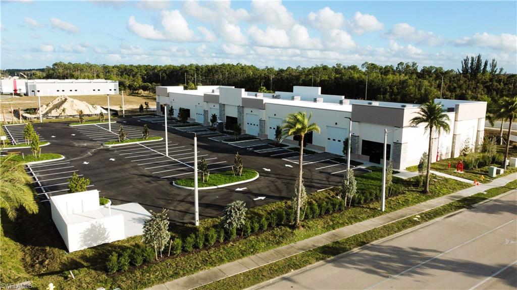 Put Your Business Where Customers Can Find You | Alico Innovation Center – Fort Myers, FL! Visibility matters, and opportunities with direct Alico Road frontage are becoming increasingly difficult to find. Alico Innovation Center offers a rare leasing opportunity with one remaining 3,486-square-foot unit available or the ability to secure the entire 19,040-square-foot building in one of Fort Myers' most active and rapidly growing commercial corridors.
This is more than warehouse space—it's a high-exposure business location designed for companies that depend on customer traffic, brand visibility, showroom presence, and operational efficiency. The flexible layout can accommodate retail, showroom, warehouse, distribution, service operations, or a hybrid business model that combines customer-facing space with back-of-house functionality. Storefront exposure, easy access, and functional loading capabilities make this property ideal for businesses looking to grow their presence in Southwest Florida.
Strategically located on high-traffic Alico Road just minutes from I-75, the property benefits from strong daily traffic counts, a signalized intersection, and surrounding residential and commercial growth that continues to drive demand in the area. Businesses seeking exposure, accessibility, and a professional image will find few comparable opportunities available in the market today.
Whether you need 3,486 square feet or the entire 19,040-square-foot building, this is a chance to position your company in one of Fort Myers' premier commercial locations.