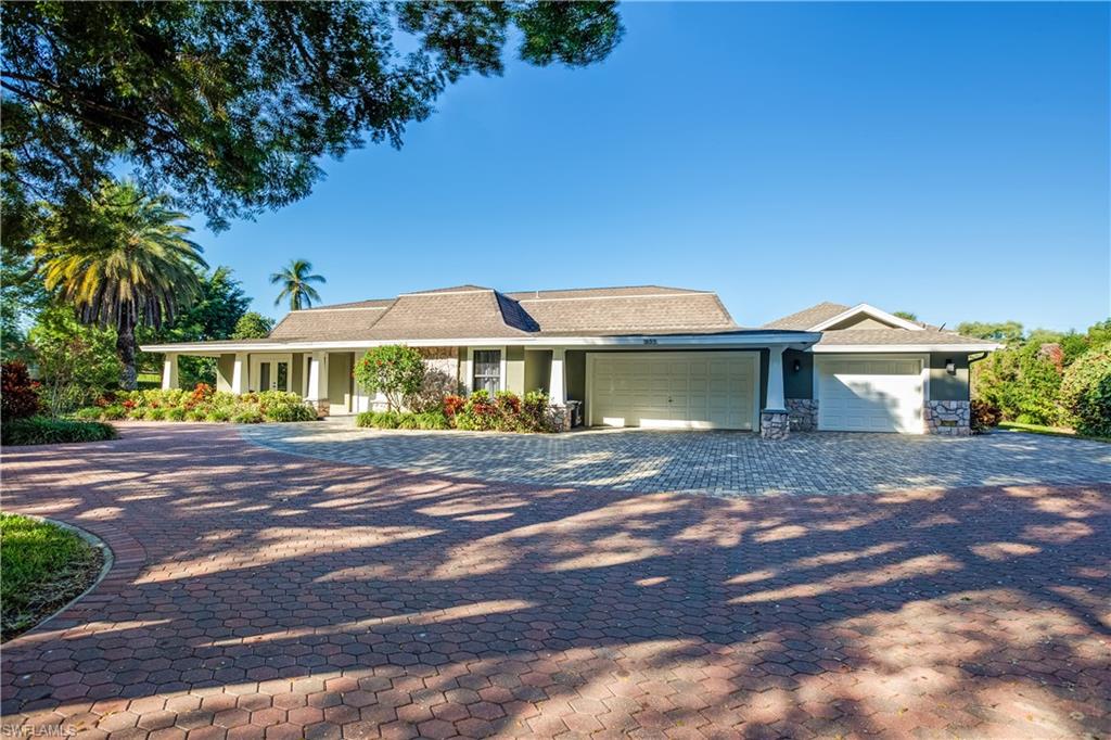 ONLY 3 BLOCKS TO BEACH!!  Ideally situated on over half an acre, parklike setting on a corner lot.  Recently renovated interior, detached poolside cabana complete with a full bath, a full bar, and nicely appointed outdoor kitchen.  This home also has a large apartment/guest wing attached to the main house.  Open floor plan with large kitchen and family opening up to the pool, hot tub, and outdoor fire pit.  Versatile floor plan that can configure up to 6 bedrooms if needed.  This is Florida living at its finest within easy walking distance to Naples fabulous pristine white sand beaches.  Also a very short ride to downtown to enjoy all that Olde Naples has to offer.  This house can easily be enjoyed as is now and serve as a pristine building lot in the future.  At over half an acre, this is one of the the largest lots in Coquina Sands.  This location is second to none!