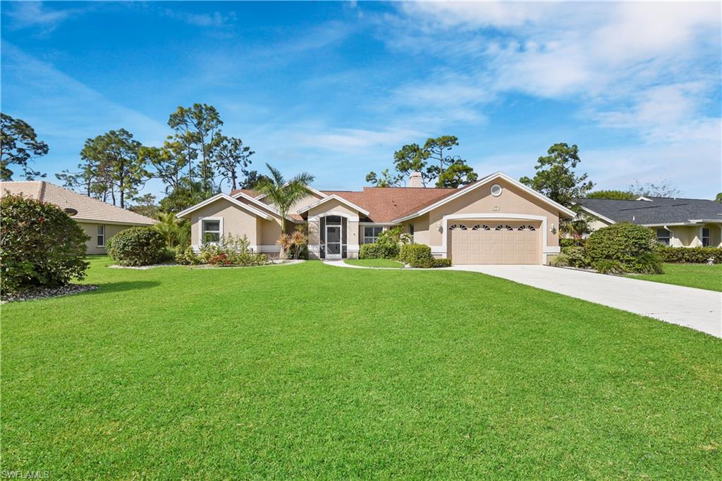 Beautiful updated POOL home w/ Lake Views! This 3 Bedroom pool home offers a great layout with 2 living areas, plus additional outdoor living space that has peaceful lake views. Features include split bedroom floor plan, huge kitchen with breakfast bar, breakfast nook, wall oven, cooktop and tons of cabinets. Family dining area, large laundry room with built in cabinets & utility sink, oversized 2-car garage, and a large under truss area on the extended screened pool lanai with electric sun shades. Vaulted ceilings, custom closet shelving, plantation shutters, fireplace in family room and lots of windows.  This home even has a well for irrigation and solar panels to heat the pool. Berkshire Lakes is a deeded lifestyle community, offering a community pool, clubhouse & exercise room w/ low HOA fees. Conveniently located to everything that Naples has to offer. After seller has spent many years enjoying life in SW Florida, her health has caused her to go back and spend time with her family, she has made many memories in this home, and it is time for a new family to make new memories.  We are sure you will love it just as much as the current owner has.