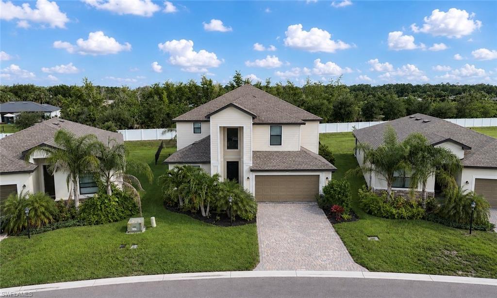 Welcome home! This IMMACULATE Monte Carlo model is officially ready for its new owners! Featuring 5 full bedrooms, 2 den spaces (one upstairs & one downstairs), 3 full bathrooms, over 3,000sqft under air, and a 3-car tandem garage, space for family and friends will never be an issue! As you walk through the front door you’re greeted by soaring ceilings and CROWN MOLDING throughout! The foyer leads you to the first den featuring stunning French doors, as well as the formal dining area. The kitchen is LIGHT & BRIGHT - featuring ample white cabinetry, a coffee nook, breakfast bar, pantry, GRANITE COUNTERTOPS, and stainless steel appliances! The open concept floor plan with additional dining space leads you directly to the main living area, which boasts an oversized window with gorgeous pool views! You and your guests will appreciate that the first floor features a full guest bath with a shower/tub combo, as well as a guest bedroom. Additionally, the first floor also boasts a large laundry room with a shortage closet, and an additional oversized storage closet under the staircase! As you head upstairs, you’re greeted by a large LOFT SPACE, which seamlessly connects the remaining bedrooms. The primary bedroom is impressive in size and offers views of the pool as well as TWO CLOSETS! The primary bath features a large walk-in shower, generous soaking tub, double vanity sink, private water closet, as well as an additional linen closet! The remaining 3 bedrooms all share a guest bathroom which is equipped with a DOUBLE VANITY sink, while the tub/shower combo are behind a privacy door. The upstairs den space is separated by solid double doors and also boasts an impressive size - perfect for an additional TV room, office space, play area, or extra bedroom! While this home has so much to offer inside, true Florida living takes place on the lanai… & this one has it all! You’ll appreciate the Southern exposure offering year round sunshine, as well as the covered lanai area for shade. The expansive pool cage encompasses the IN-GROUND POOL/SPA, perfect for both hosting and relaxing. The backyard is completed by a fence, making it truly move-in ready! Portico offers resort style amenities including a gym, community pool, pickleball, tennis, basketball court, play area, and professional management. The residents of Portico enjoy ladies nights, monthly corn-hole tournaments, food truck Monday’s, golf cart parades, and so much more! Located just a short drive from I-75 and all of Fort Myers best dining and shopping options, this home has it all… The only thing missing is YOU!