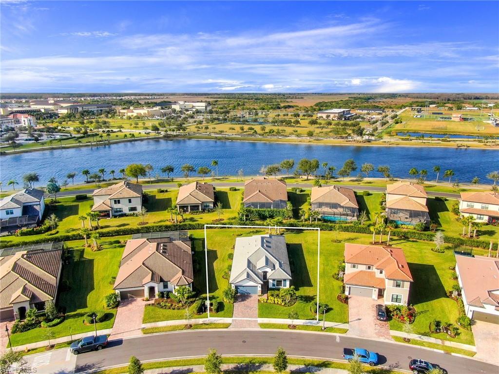 Prime Location!!! Welcome to Avalon Park, one of the most desired communities in Ave Maria Florida.  This wonderful & stunning “Summerwood Floor Plan” Single Family  Home, almost like brand new, features nearly 2,000 Sq. Ft of living space, plenty of natural light, high ceilings, 2 large bedrooms, plus a large den, 2 Full bathrooms, 2 car garage extended to fit a golf cart . With over $95K in exclusive upgrades, chef’s kitchen with quartz countertops, huge island, Kitchen-Aid appliances, glass back plash, LED lighting, tile throughout and carpet in 2 bedrooms, Spacious Master bedroom, large walk-in closet. Step out through the recessed hurricane rated sliding doors from the great room to the extended screened lanai with pavers. Avalon is Ave Maria’s newest community with low HOA fees that include lawn care. Conveniently located nearby Publix, Town Center, Water Park, dining and stores. Ave Maria amenities include parks, walking/jogging trails, dog park, fitness center, and more. Ave Maria, community of the year from 2015 thru 2020!
