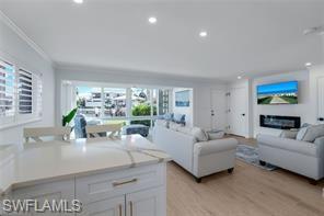 Long term lease offered in ONE of the BEST LOCATIONS in NAPLES & FULLY RENOVATED with BAY VIEWS!! This Highly desirable CORNER UNIT is situated just SOUTH of Doctors Pass! Port Au Villa is located directly across the street from The Moorings Private Beach Park! The Private Beach offers shaded beach parking, covered pavilions, large open greenery, lushly landscaped seating areas, play areas for your kids or grandkids and is exclusive to Moorings Residents. YOU HAVE TO SEE IT FOR YOURSELF. The Owner spared no expense reimagining this Beautiful BEACH RETREAT!. The home has IMPACT Glass throughout, Electronic Roll Down Shutters, CUSTOM Window Treatments, Quartz Countertops, CAFE Appliances and LED Lighting. Boat slips may be available to lease from other owners. Located One Mile South of Port Au Villa is The Newly Opened Four Seasons Naples Beach Resort; Just 3 miles South are the Pedestrian Friendly Promenades of Historic 5TH AVE SOUTH! Come RELAX and Enjoy the SUNSHINE in one of Naples most coveted locations! Offered turnkey on an annual lease plus utilities or Short Term Including Utilities at a short term lease rate plus applicable taxes under 6 month terms.