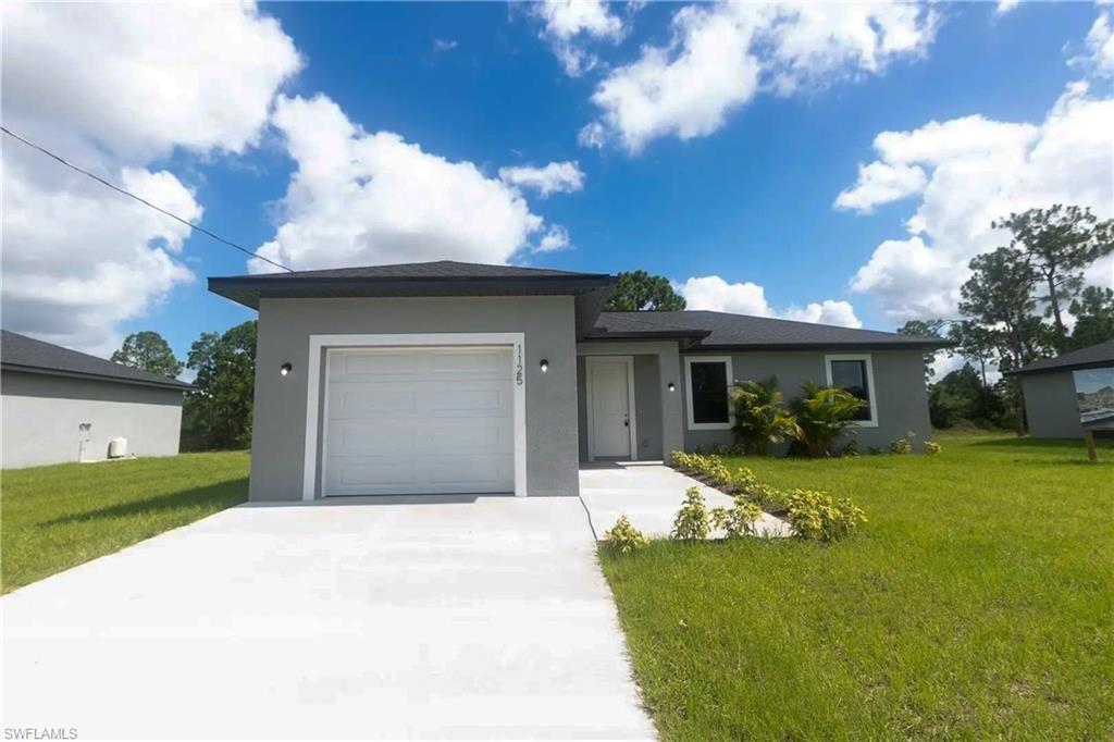 Welcome Home! This recently built, thoughtfully designed single-family residence in the heart of lehigh acres. Featuring 3 spacious bedrooms, 2 baths, and 1,698 sq. ft., the home is perfect for both family life and entertaining.

The open-concept layout showcases a gourmet kitchen with quartz countertops, stainless steel appliances, and a peninsula island. Retreat to the master suite, complete with a walk-in closet and dual-vanity en-suite featuring a luxurious walk-in shower. Additional highlights include energy-efficient windows, a 1-car garage, and a private backyard ready for your personal touch. Located near schools, dining, and recreation, schedule your private showing today!