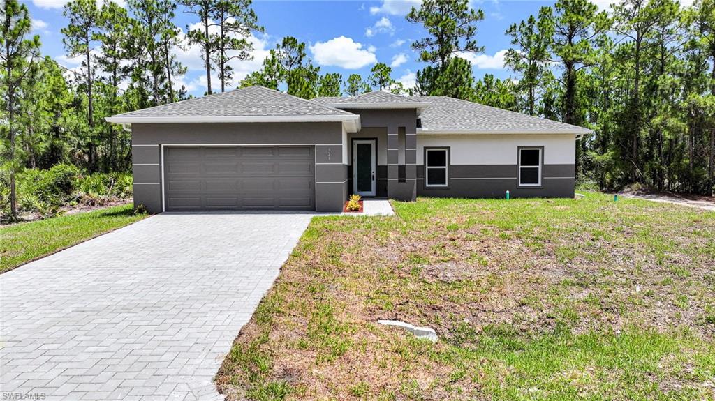 FRESHWATER CANAL HOME! FISH FROM YOUR OWN BACK YARD! You Will Be Amazed By The Quality Of This Brand New Construction 3 Bedroom (Plus Private Home Office/Den/Or 4th Bedroom With Solid Wood French Doors) 2 Bathroom/2 Car Garage Canal Home With Northern Exposure For Those Stunning Florida Painted Sunsets & Sunrises, All On An Oversized 1/4 Acre Canal Lot In Lehigh Acres, FL. This Spacious Home Comes With 1682 SF Under Air And Is COMPLETELY Finished With A Certificate Of Occupancy (CO)! You Can Move Into This Home Today Or Use It As A Cash Flowing Rental Unit (Very High Demand). The Gourmet Island Kitchen Comes With Quartz Countertops, STAINLESS STEEL APPLIANCES, Real White Wood Shaker SOFT TOUCH Cabinet Doors & Drawers, Tile Backsplash, Floor To Ceiling Pantry, Stainless Steel Tub Sink, Modern Lighting, And A Large Breakfast Bar. Other Upgrades Include; FREE BRAND NEW WASHER AND DRYER WITH PURCHASE OF THIS PROPERTY, HURRICANE IMPACT GLASS WINDOWS AND DOORS, Large Designer High Gloss Porcelain Tile Flooring Throughout Entire Home, PAVER DRIVEWAY, High Ceilings, Large Living Room, Upgraded Baseboards, Large Dining Area, Custom Interior/Exterior Two-Tone Paint, Custom Ceiling Fans, Modern Lighting, Large Walk-In Closets, Quartz Countertops In The Bathrooms, Huge Back Yard, New Landscaping Package, Epoxy Coating In The Garage And On The Open Covered Lania, And A Laundry Area Including A New Washer & Dryer Inside Of The Home. This Home Is Very Close To Regional Shopping Malls, SR 82 And Fort Myers, Golf Courses, Interstate I-75, Regional Airport, FGCU, Restaurants, Schools, Golf Courses, MLB Spring Training Baseball, Outdoor Parks, Boat Ramps, Amazing Fishing, And Those White Sand Beaches Of The Gulf Of America! Pools & Fences Can Be Added! DOWN PAYMENT ASSISTANCE IS AVAILABLE!