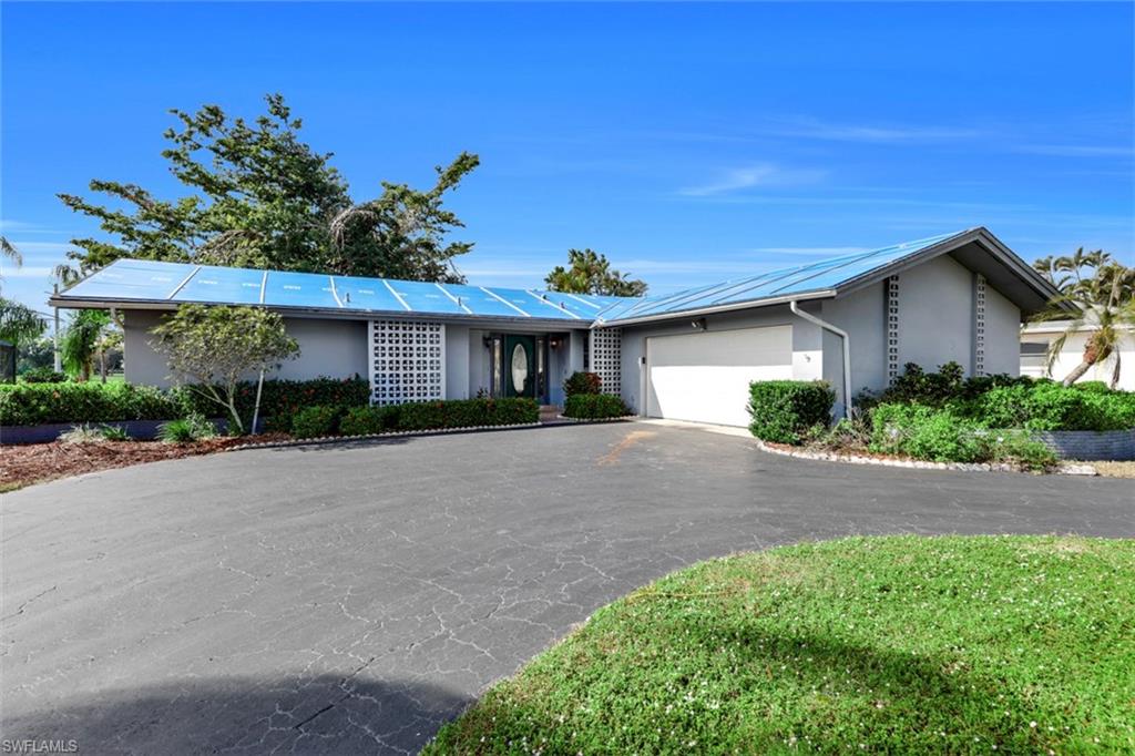 What a beautiful opportunity to own a 2 bed/2 bath home in Lely Golf Estates - Naples, Florida! A low HOA, golf course community, southwest-facing and a partial lake view - what more could you ask for? Close to downtown Naples, this well-established community is near the Naples Zoo, Botanical Gardens and many other conveniences. This quiet neighborhood offers mature trees, peace and serenity. Well maintained over the years and updated in the early 2000's, this home offers simplicity and cleanliness with a mixture of carpet and tile flooring. You will enjoy many nights on your lanai catching the last of the sun’s rays. All appliances are included in the eat-in kitchen, as well as the laundry. With minor updates, this home  has the opportunity to quickly build equity. Make cosmetic updates at your leisure, and be prepared to stay for a long time. Bring your golf clubs, sunglasses, friends and family - everyone will love your slice of paradise.