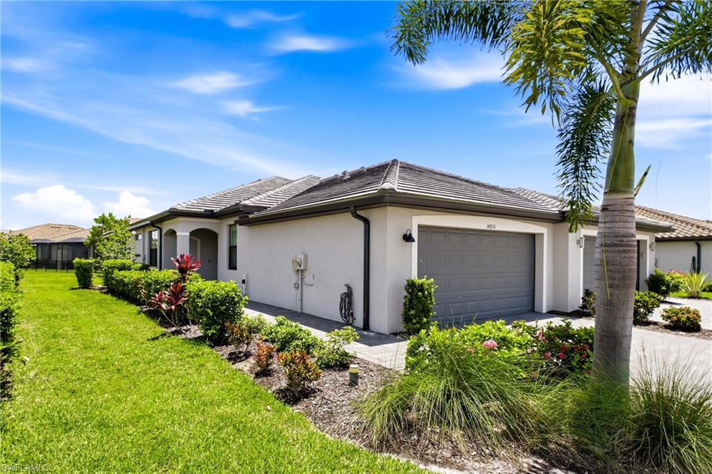 An amazing 2 bedroom plus a den villa includes hurricane impact glass and an extended lanai! From live music to events, it’s a Vacation every day at Timber Creek, with the most robust amenity package in gated development today featuring indoor and outdoor restaurants, resort pool, lap pool, splash pad, a complimentary coffee café, fitness center, Interval Training Room, saunas and locker rooms. Has full court indoor basketball, indoor pickleball, indoor volleyball, social hall, arcade, and kids playroom! Outside features 4 tennis, 4 pickleball, a basketball court, 2 bocce courts, sand volleyball, a putting green, an event field and firepit! I75 just 5 miles away with quick access to beaches, just minutes to Jet Blue Park, the Airport, Gulf Coast Town Center, Downtown Riverfront Historic District, and all the daily stops along Daniels and Colonial Blvd as well as boutique stores and dining in Gateway! Plenty of parking for golf carts you’ll feel like you’re at a resort where the fun never ends! Immediate move in ready!