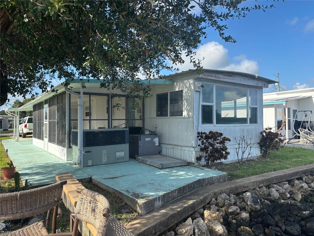 Want to live RIGHT on the water? Look no further. This community is located on the beautiful Caloosahatchee River. This remodeled 1971, 672 Sq. Ft. of living space, mobile home comes fully furnished, with one bedroom, a den that could be a second bedroom, and one bath. New Kitchen, with all new Stainless-steel appliances in 2024.  Bathroom, and new furniture with large Samsung TV and Electric bed with new Sealy King size Mattress and other room has a twin Tempur-Pedic mattress. With a screened in porch. Has community washers and dryers available.

This community is 55+ and has a boat basin for up to 20 ft boats and dry storage.  Has a storage shed with electric. Low maintenance fee of $240.00 a month which includes water, grass cutting and tree trimming. With purchase of the mobile home, you get a share in the corporation.
This home has spectacular river views in both directions.  Has direct gulf access, Lake Okeechobee access and Atlantic Ocean access.  No pets allowed.
Small flat boat with a Honda 60 HP 4 stroke and all aluminum trailer for sale also.