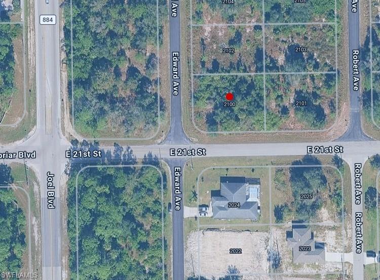 Great Corner lot with a fresh paved road and electric available at the property. Make an offer today, this one is priced to sell!